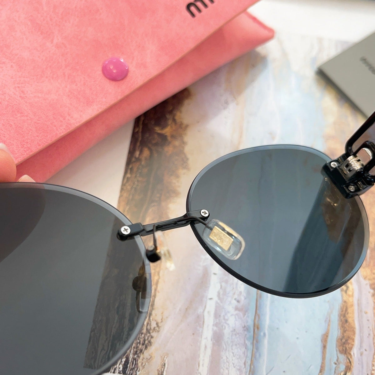 MIU M SUNGLASSES