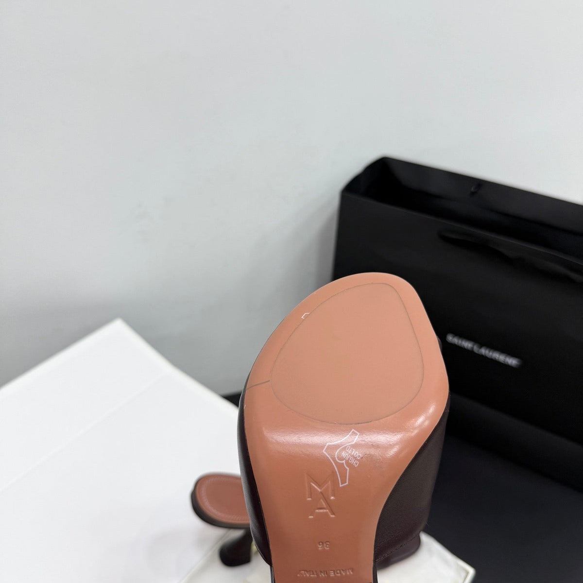 AMINA M HEELS