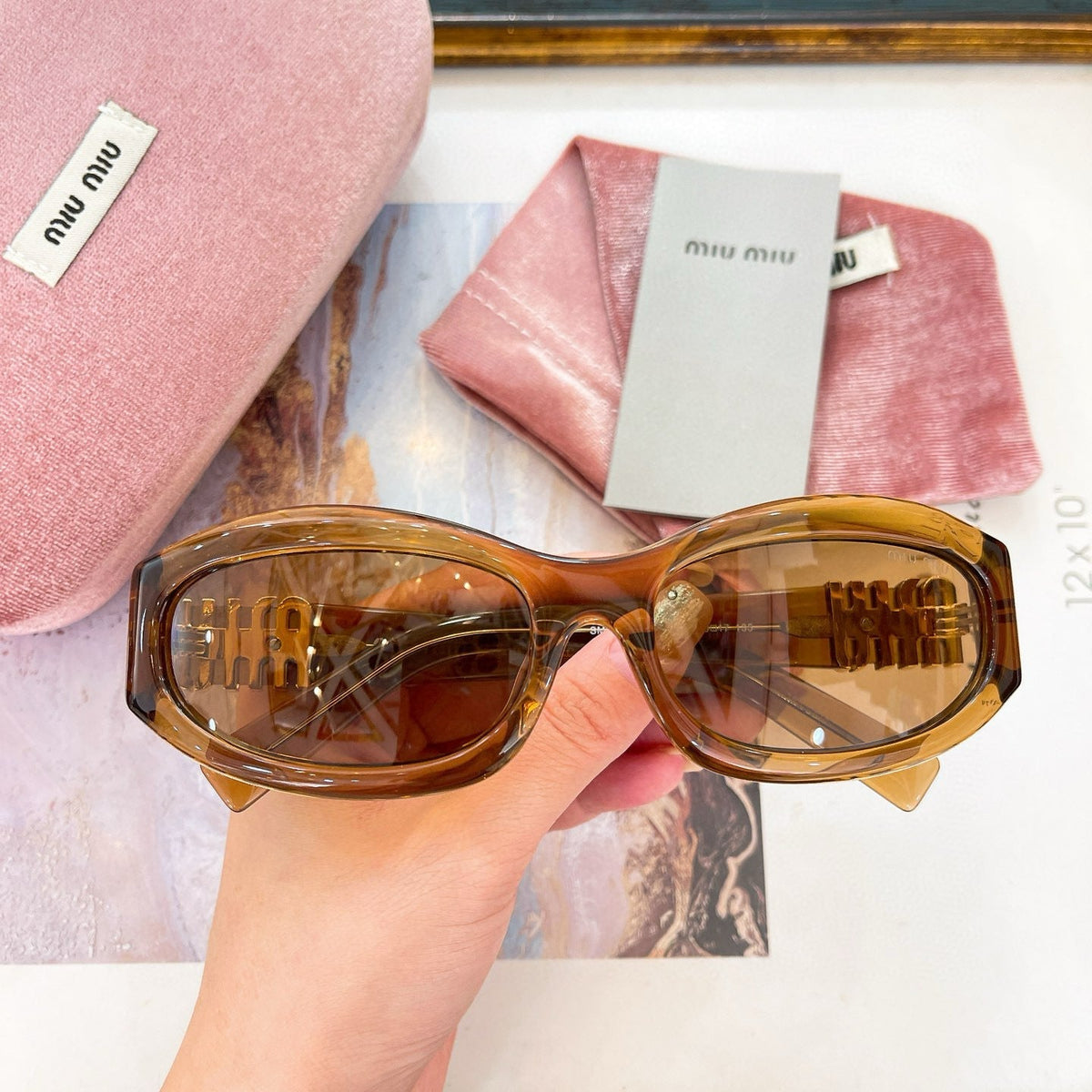 MIU M SUNGLASSES
