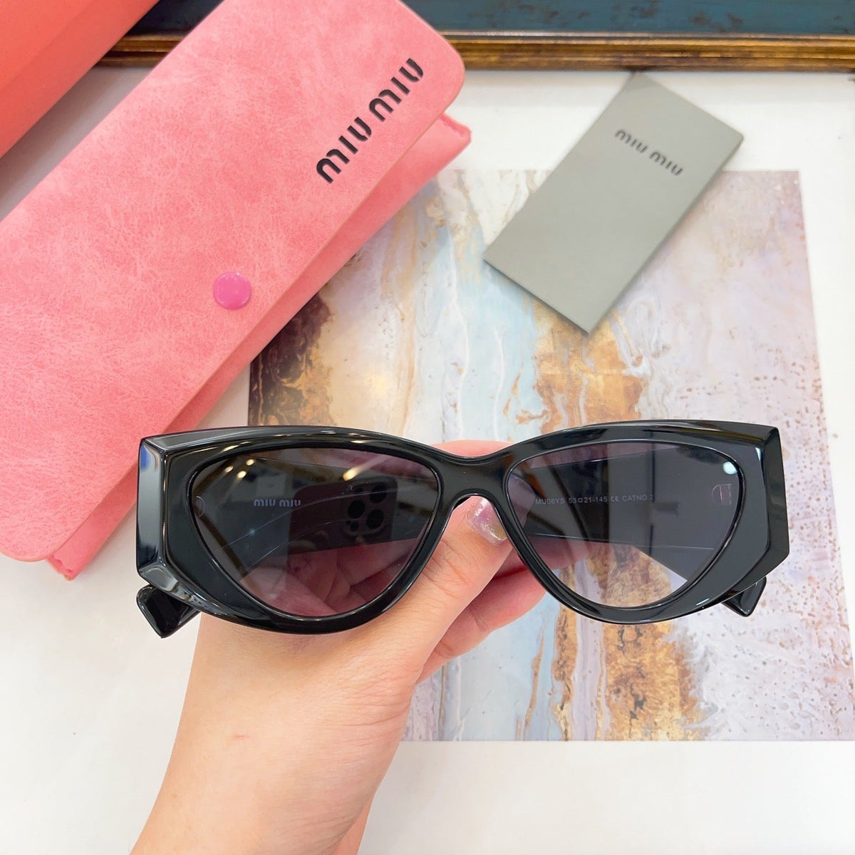 MIU M SUNGLASSES