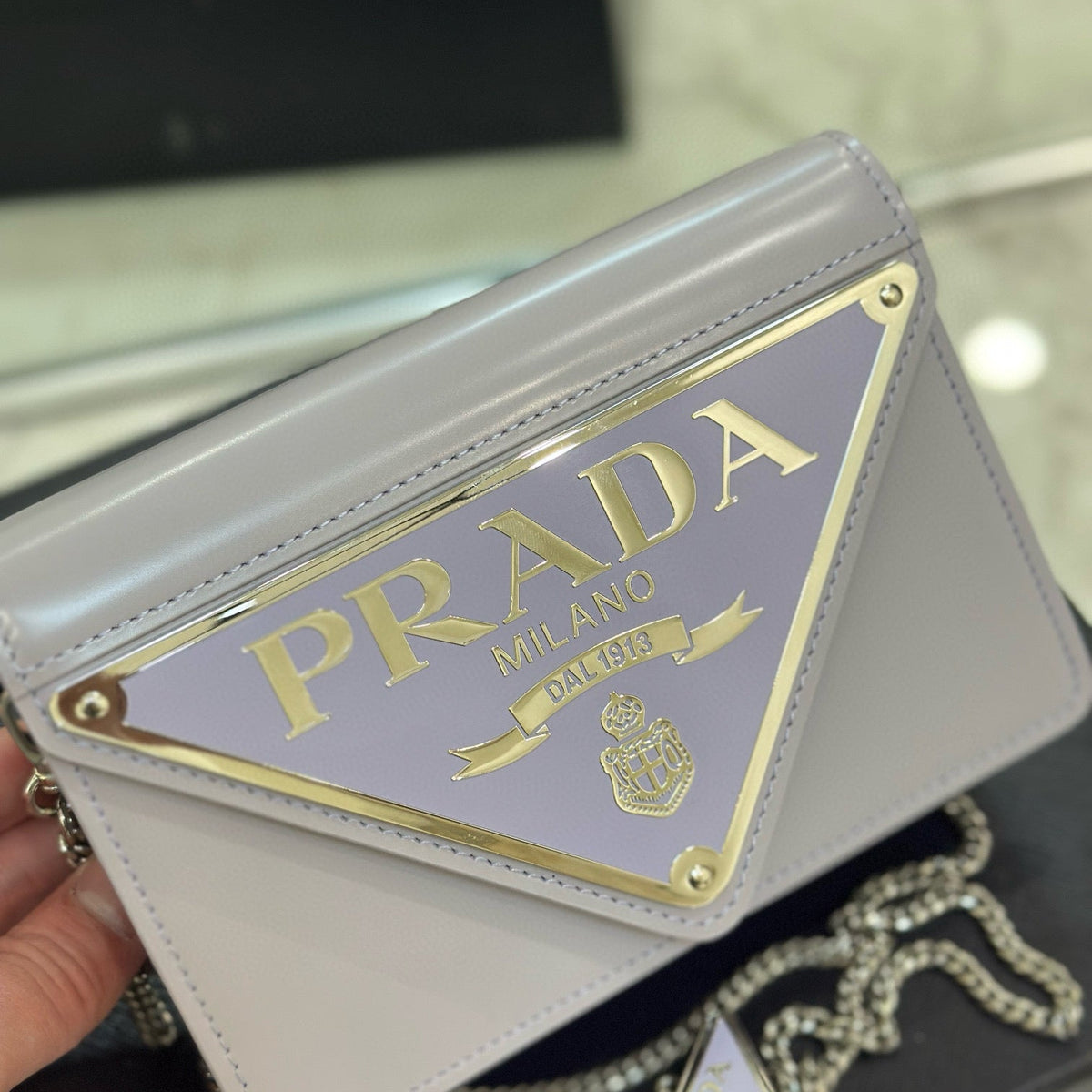 PD TRIANGLE LOGO BUFFED SHOULDER BAG