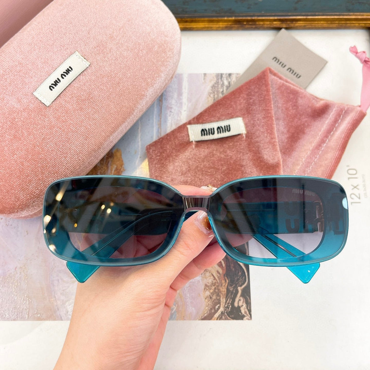 MIU M SUNGLASSES