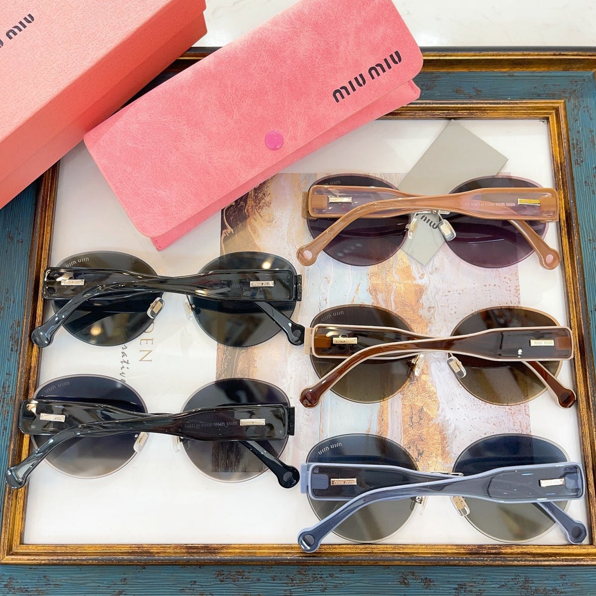 MIU M SUNGLASSES