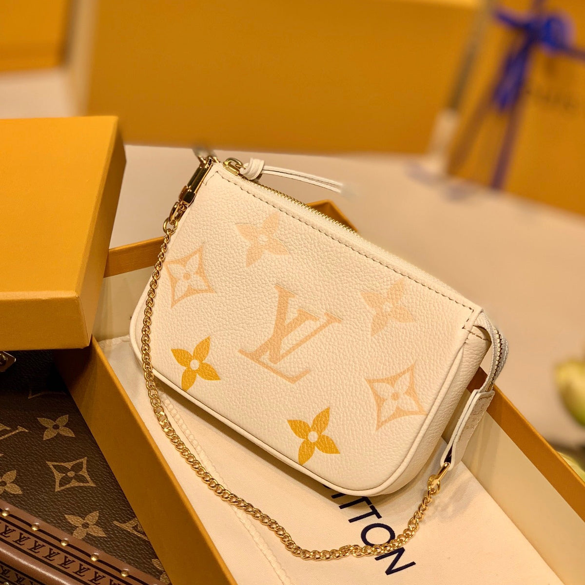 LOU MINI POCHETTE ACCESSOIRES