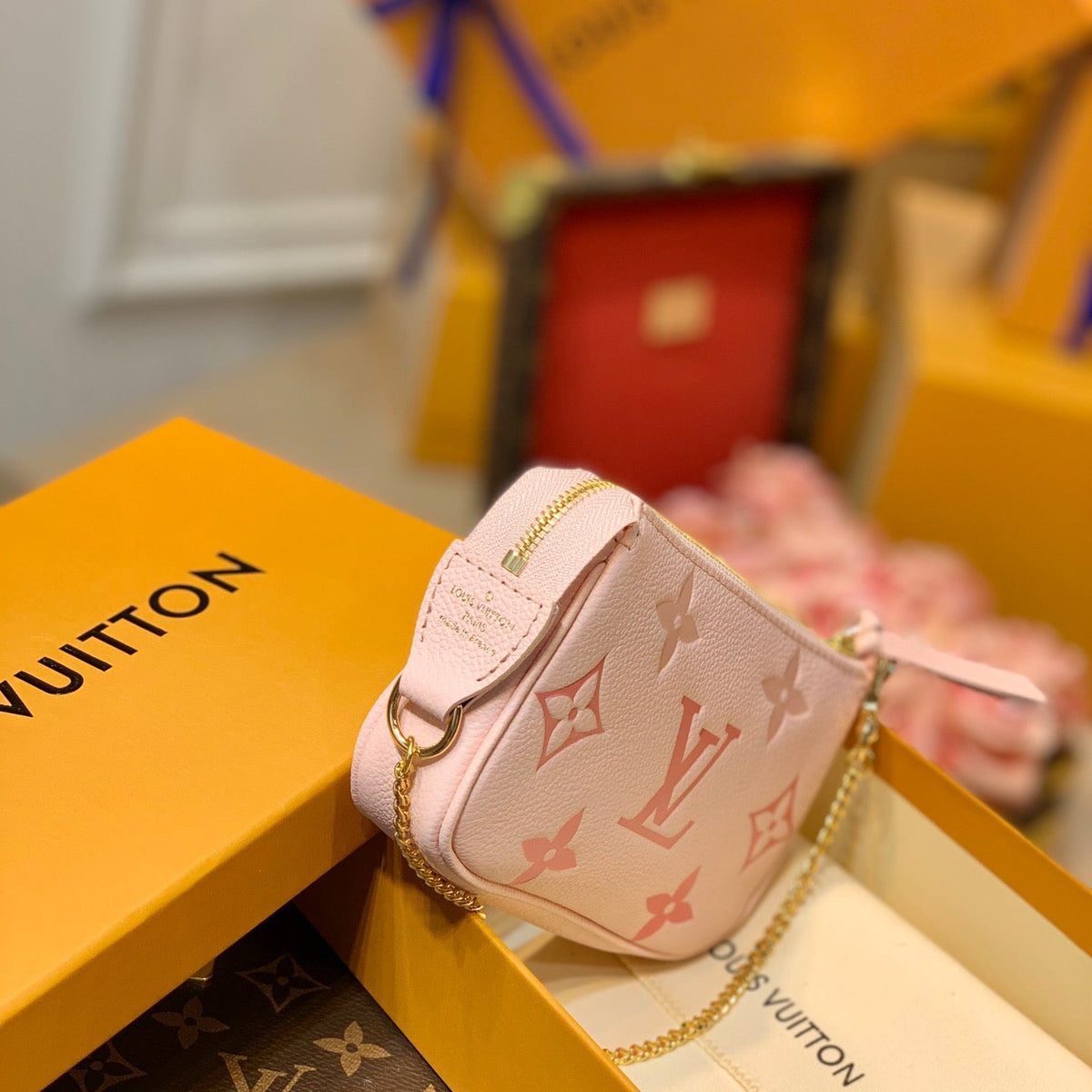 LOU MINI POCHETTE ACCESSOIRES