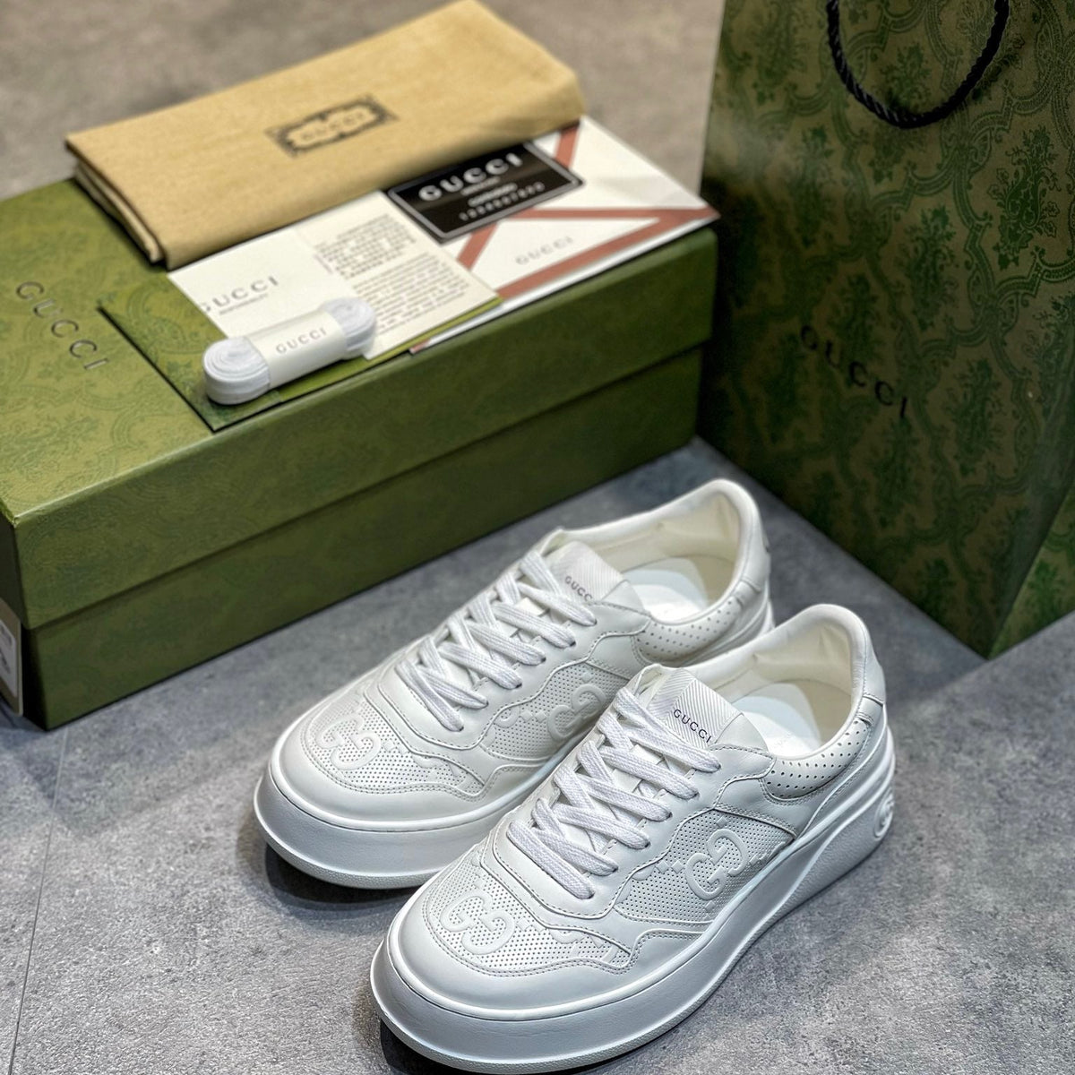 GG EMBOSSED SNEAKER