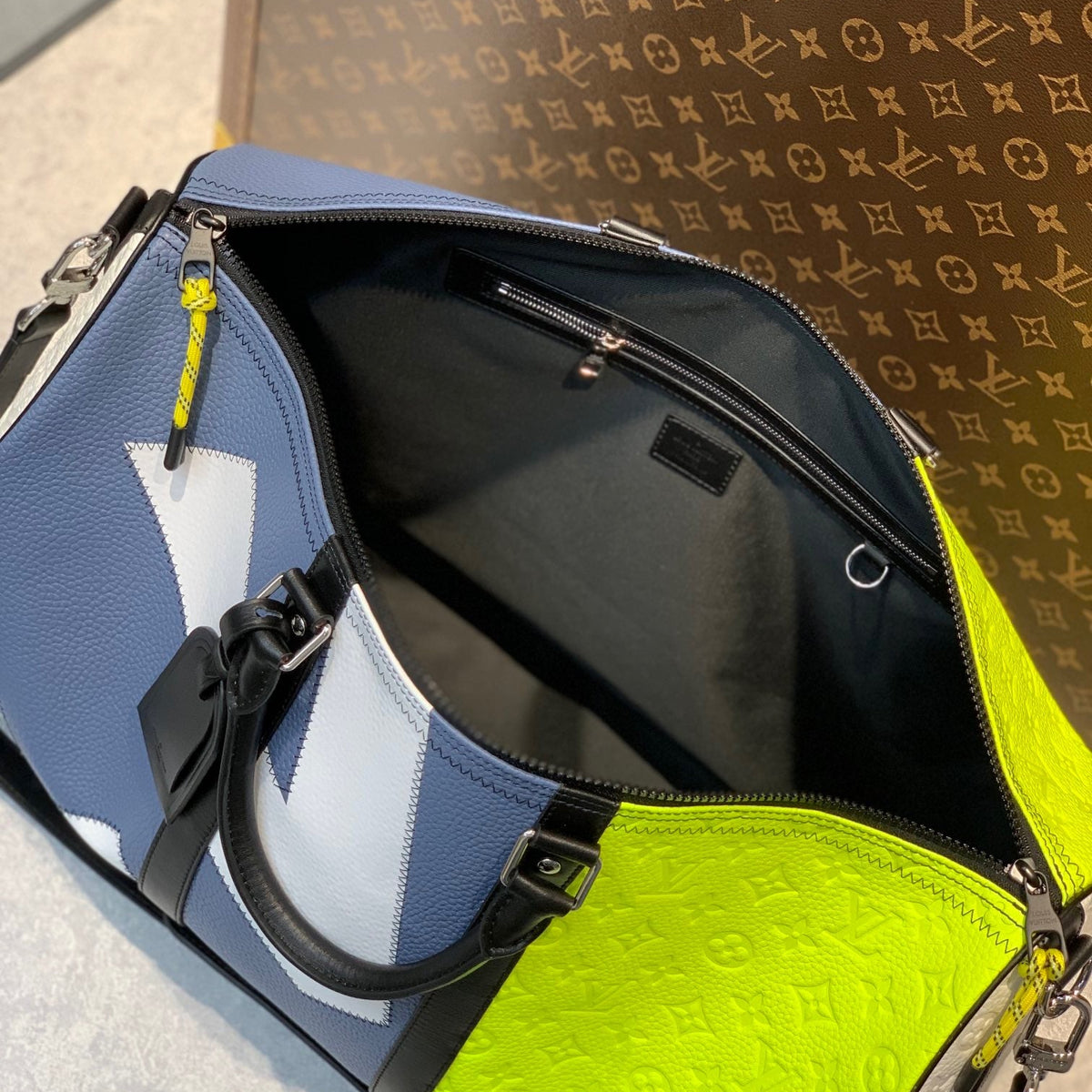 LOU KEEPALL BANDOULIÈRE 50 BAG