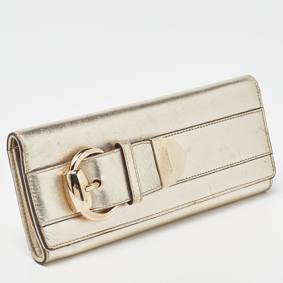 GUCCI Gold Leather Romy Clutch